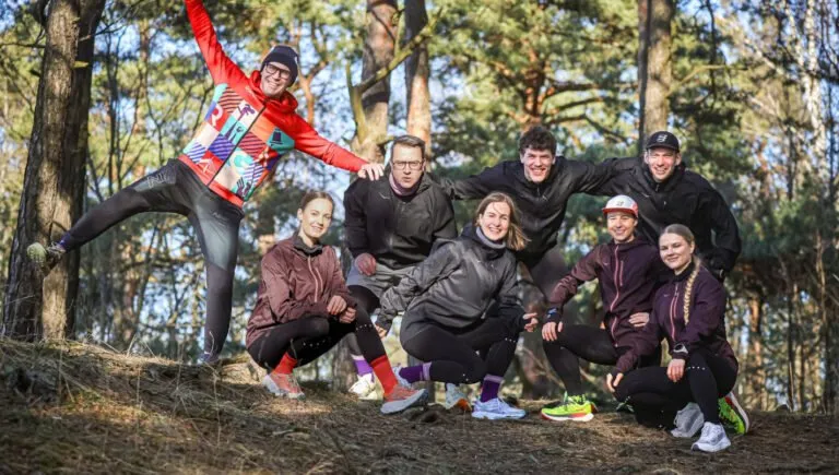 Group of trail runners on a forest course